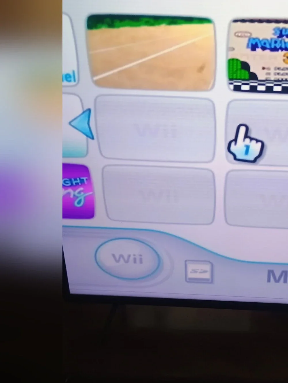 Nintendo Wii Bundle with 4 Games Black Console and White Controllers